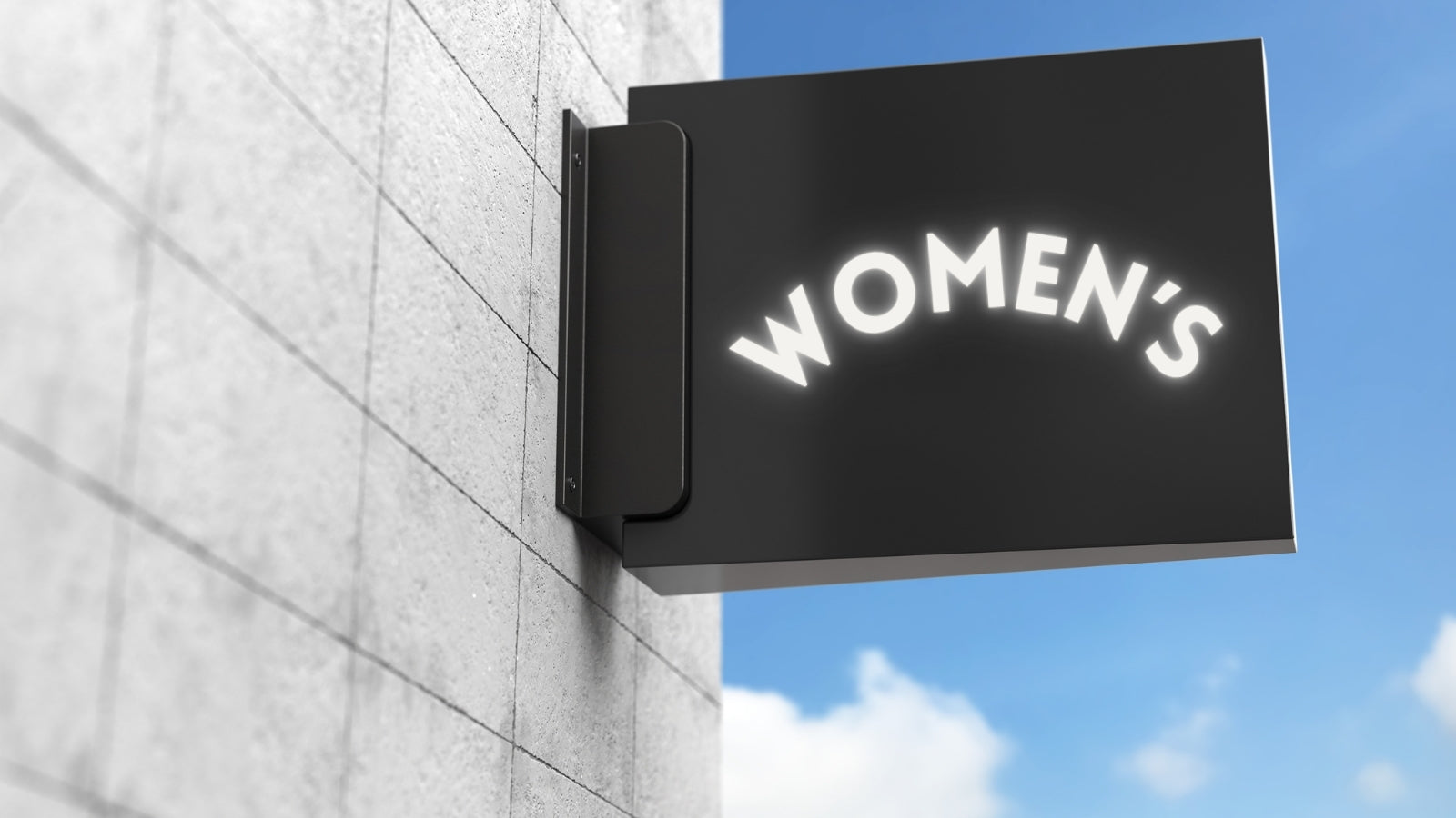 Sign on wall that says "Women's"