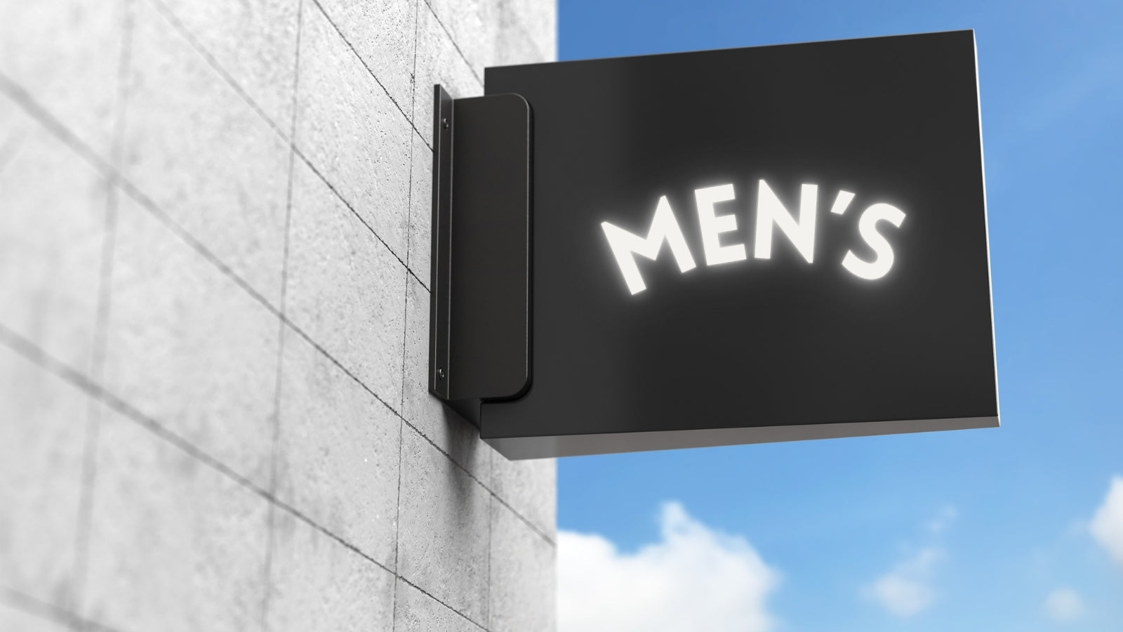 Sign on wall that says "Men's"