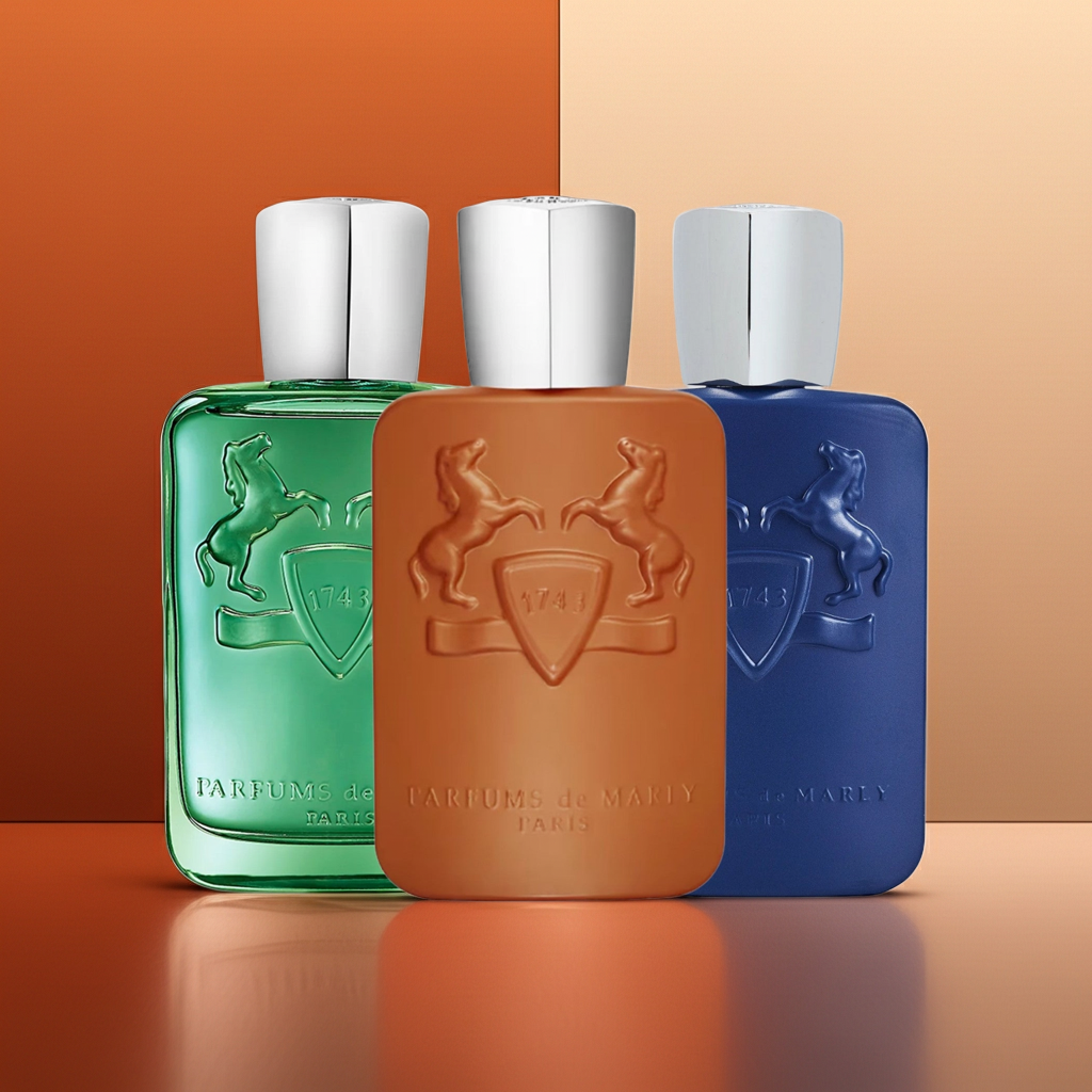 Three perfume bottles in green, brown, and blue with a brand logo on an orange and beige background.