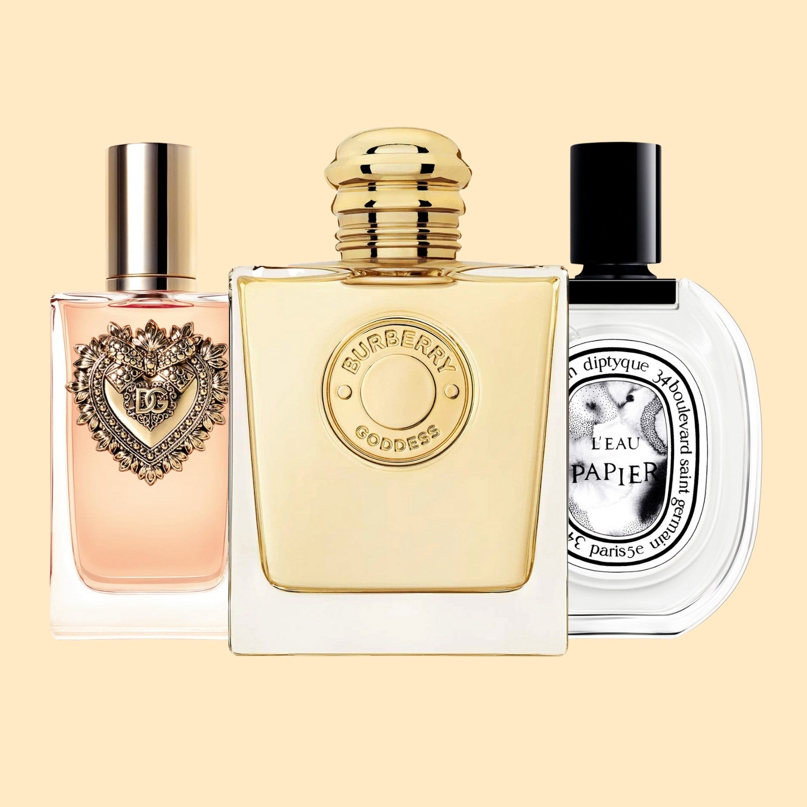 Set of Dolce and Gabbana Devotion Eau de Parfum, Burberry Goddess Eau de Parfum, and Diptyque L'Eau Papier for Women, front view on light background
